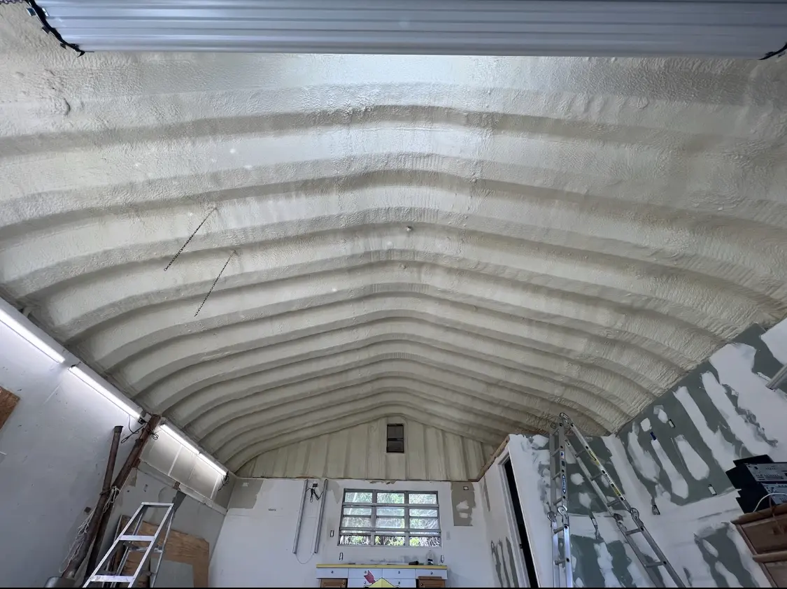 Spray polyurethane foam applied to the underside of a metal roof deck in Middlesborough